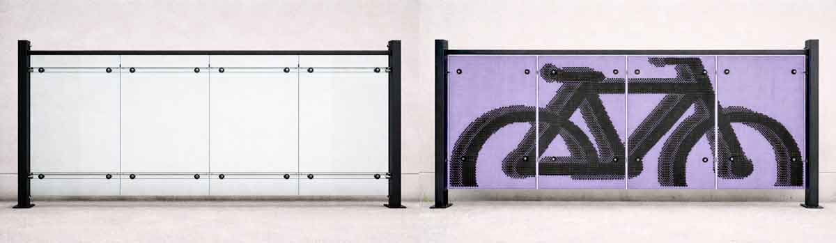 Panel trasero para marquesina de bicicletas en cristal y metal perforado con silueta de bicicleta